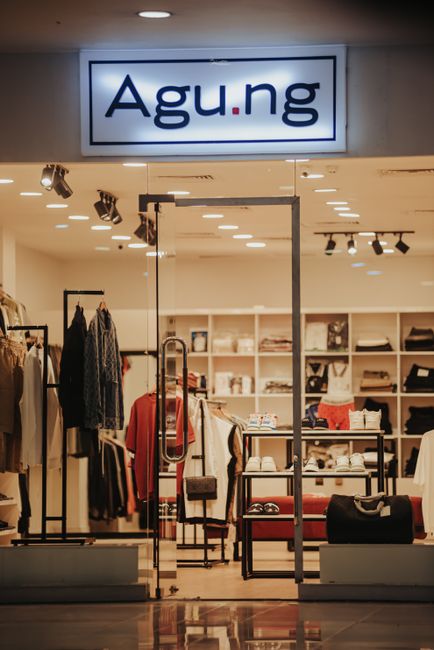 Stylish retail shop with modern layout, showcasing luxury display and ambient accent lighting