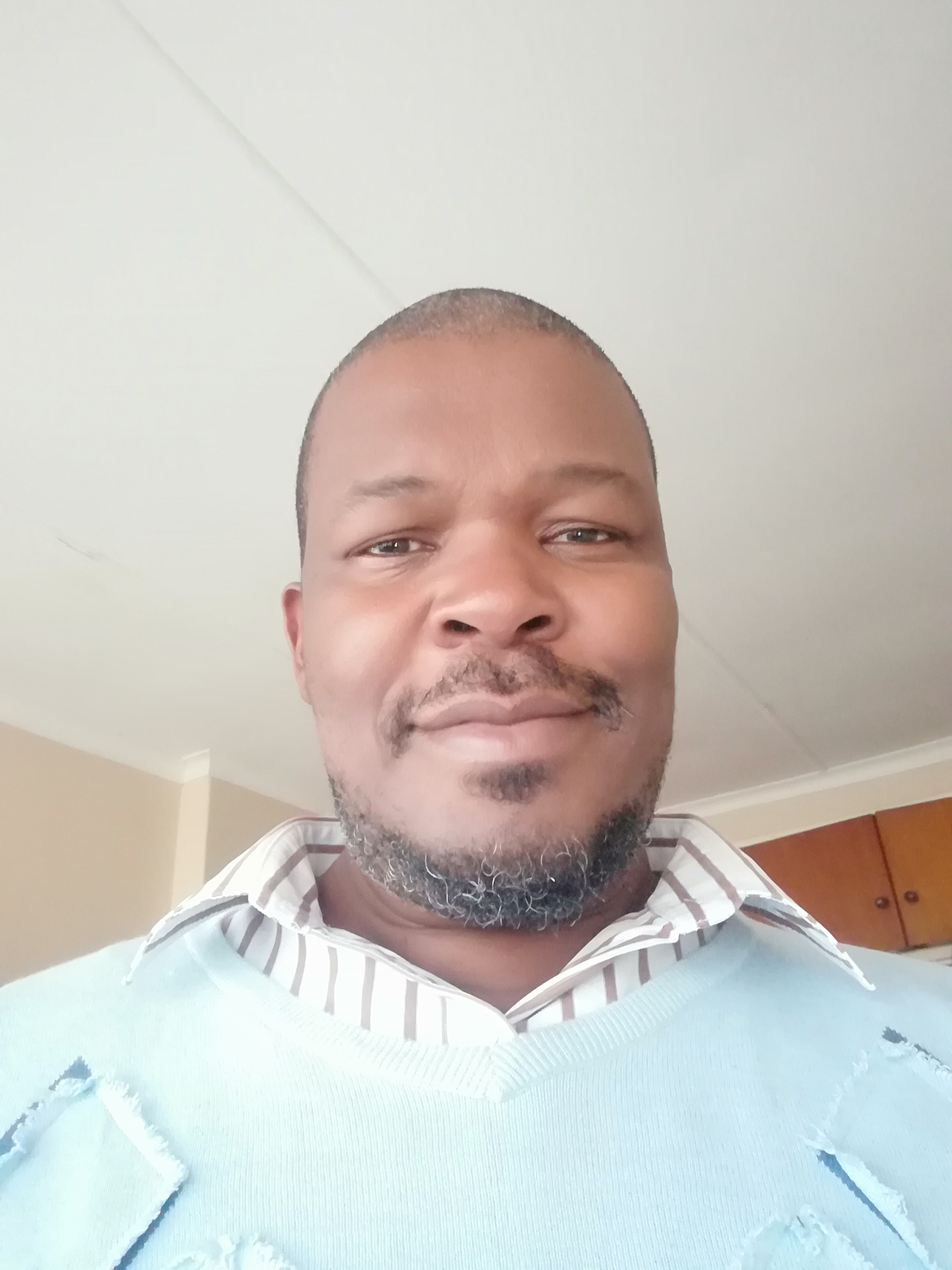 Sikhumbuzo Simamane - Principal Property Practitioner portrait