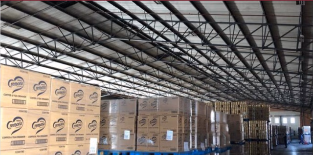 Logistics hub exterior showing dock levellers and direct shutter door loading bays